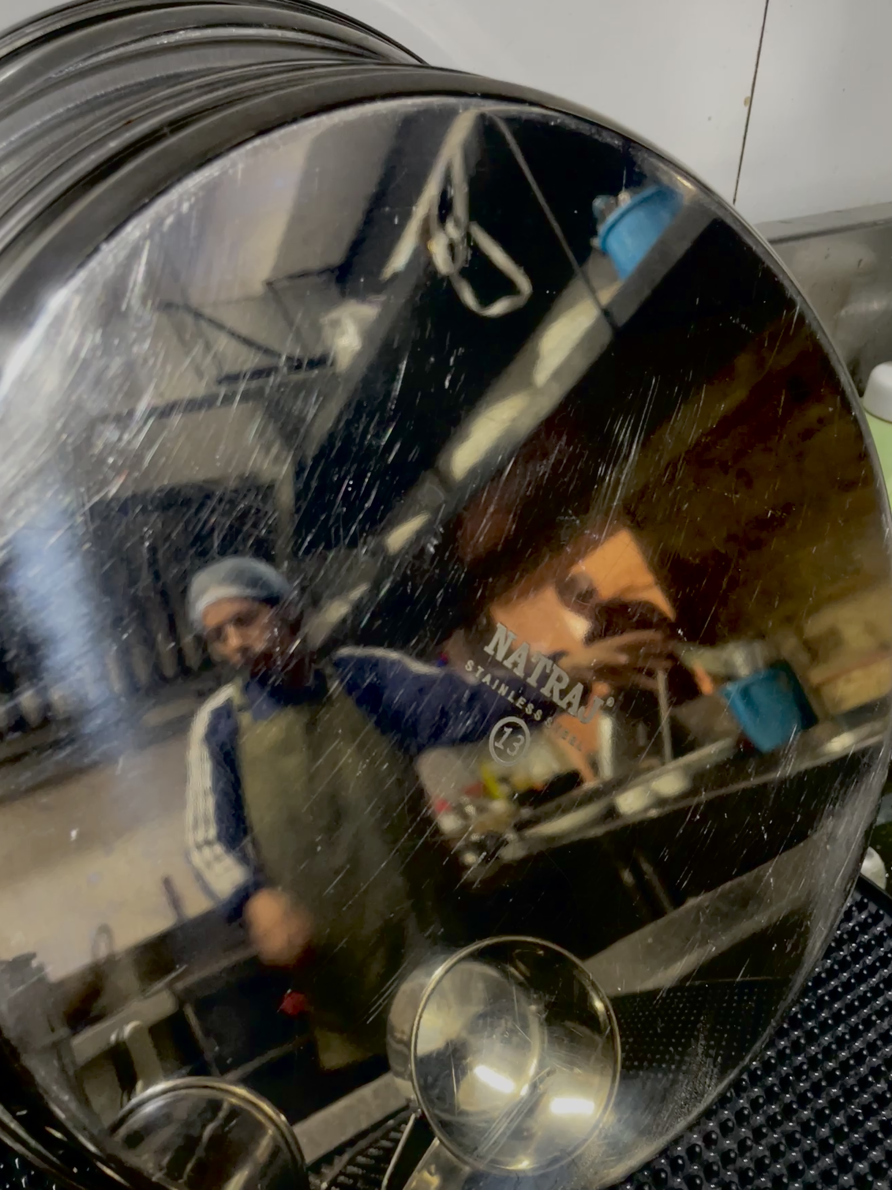 Reflection of kitchen staff